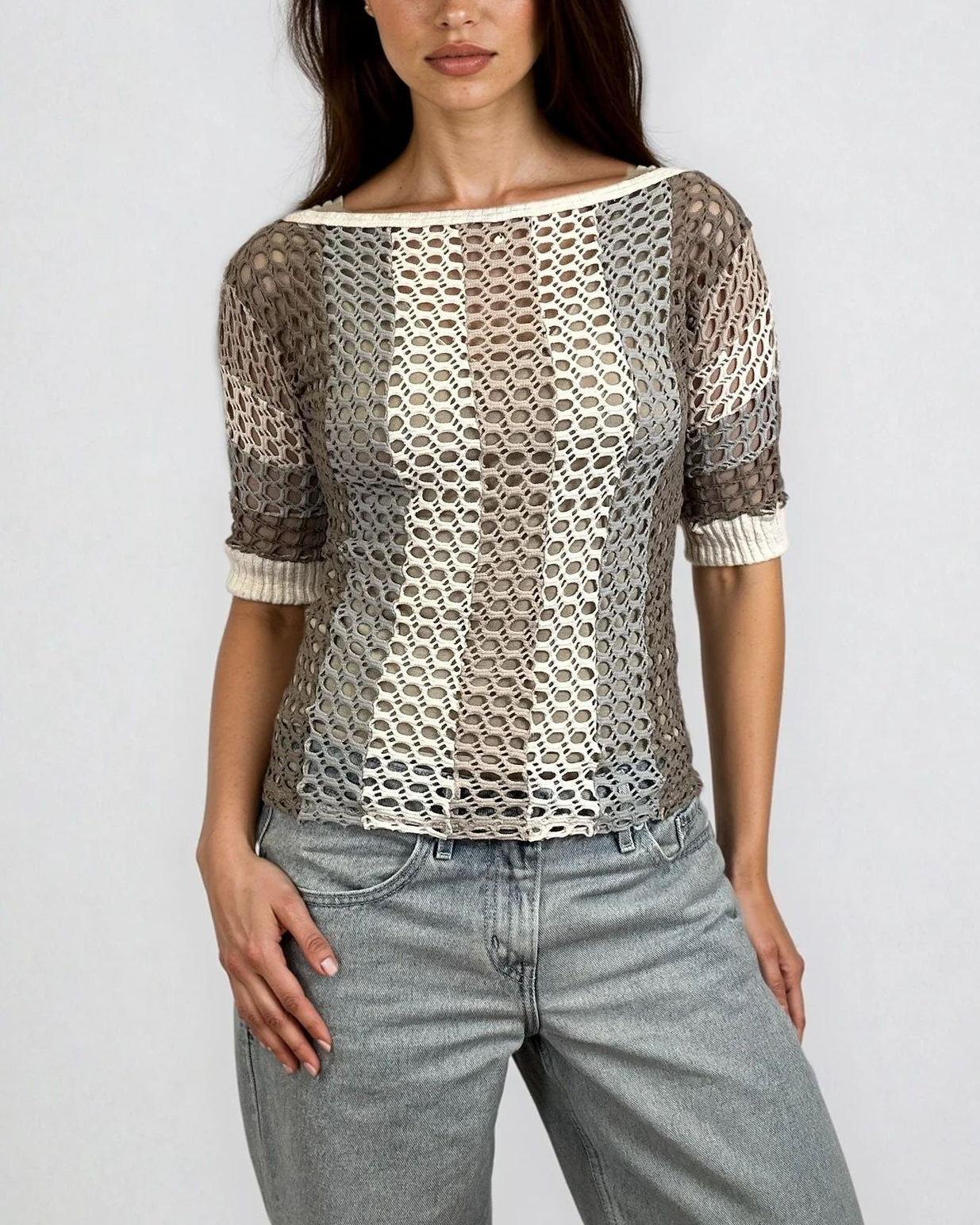 female model wearing boat neckline, bark combination, shades of brown, white, oatmeal, linen, ivory, grey, greige, beige. crochet, elbow sleeves, color block, stripes, lining, tank top