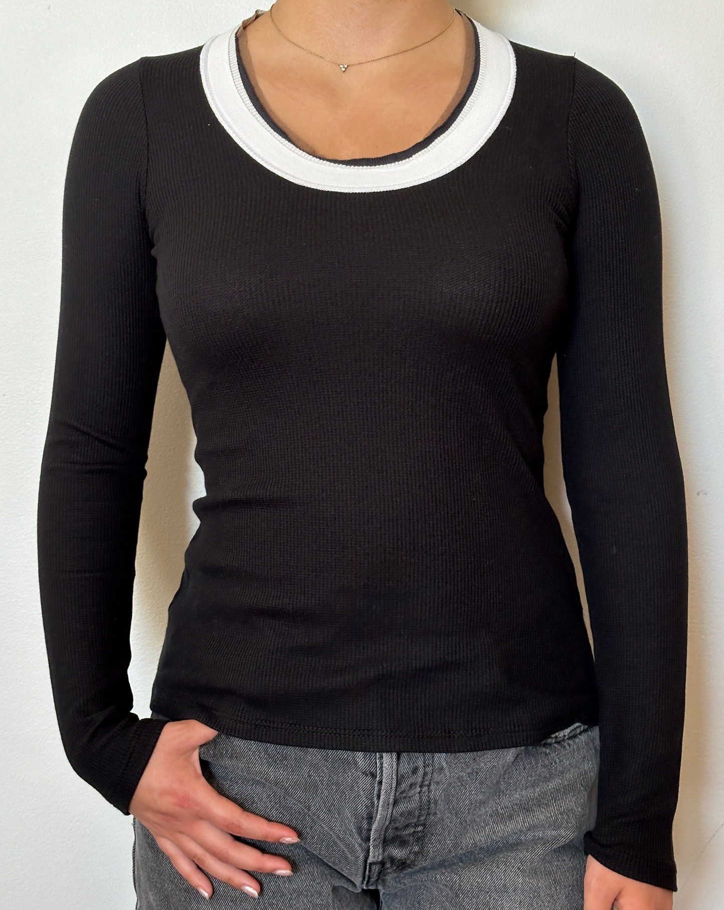 Female model wearing a black, white, and bark (beige) long sleeve cotton thermal knit - Pete Collection