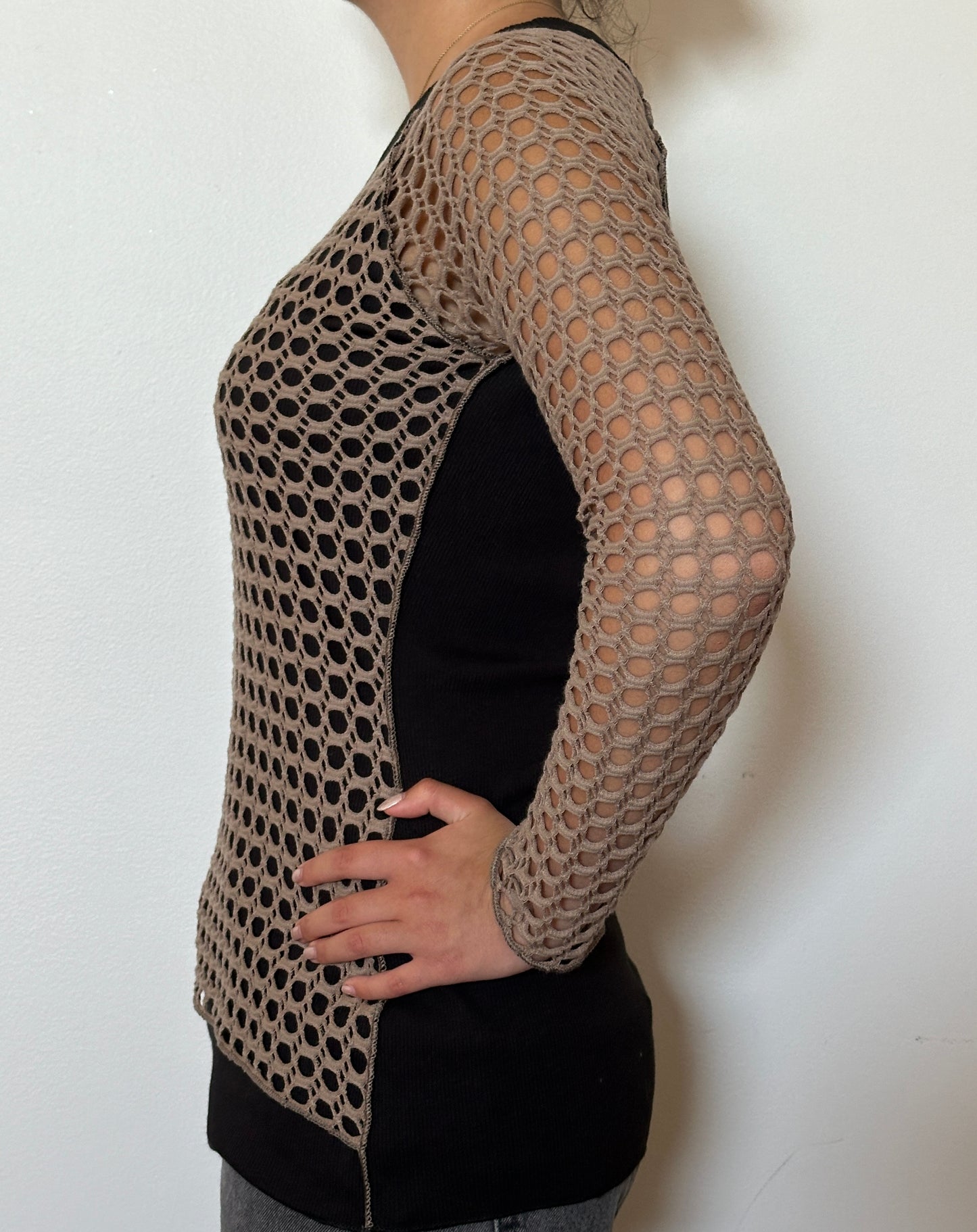 Female model wearing a crochet bark (beige) and black long sleeve cotton knit - Pete Collection