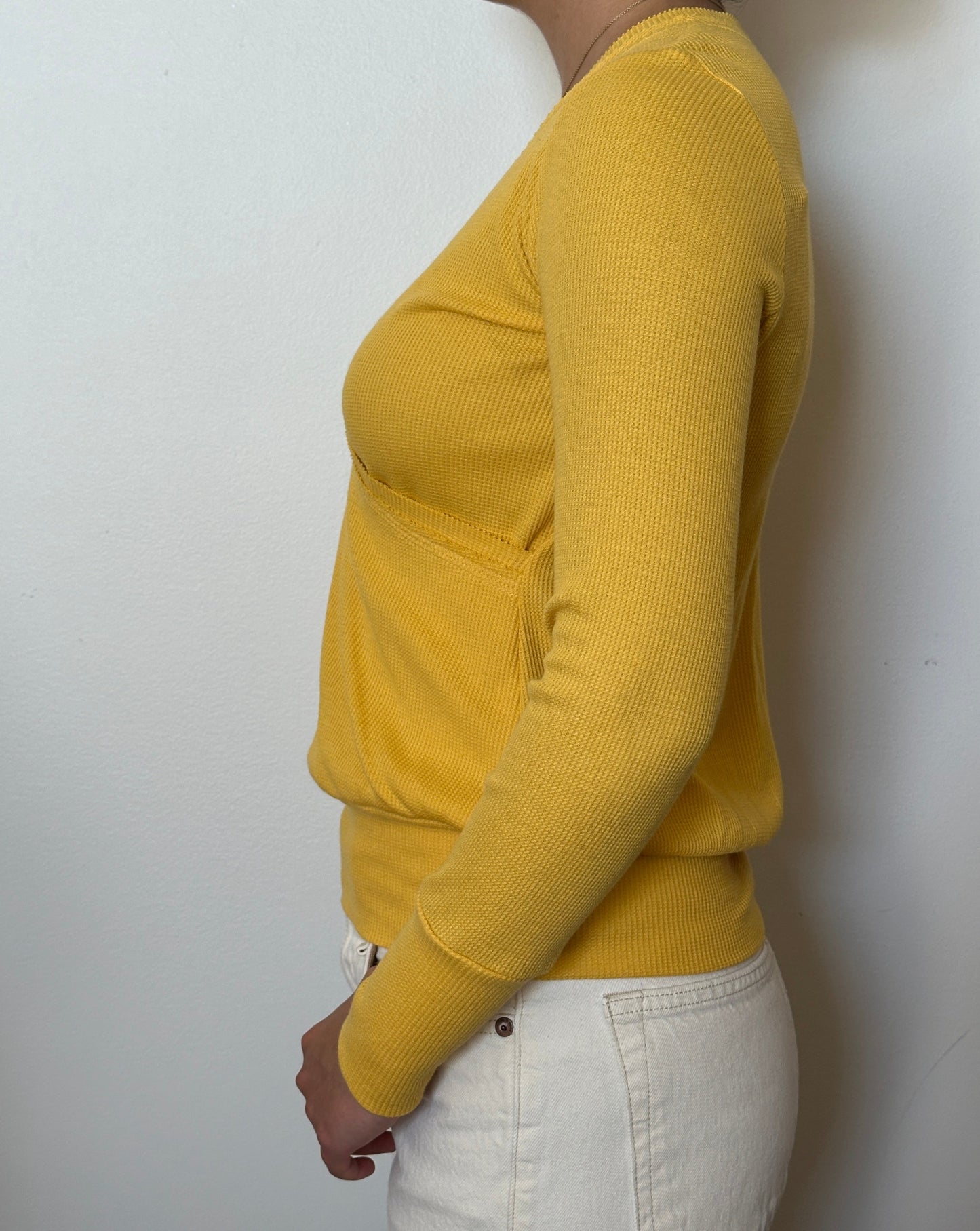 Female model wearing a tuscan sun (yellow) long sleeve cotton thermal knit wrap top - Pete Collection