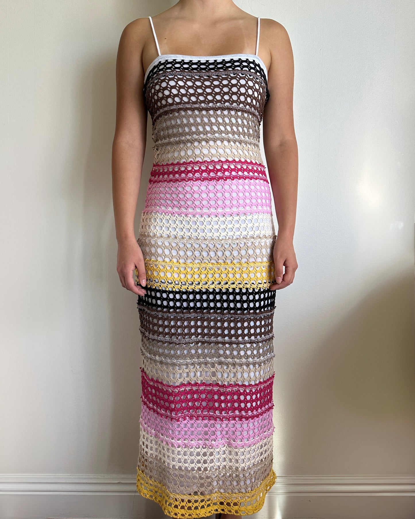 Female model wearing an spaghetti strap color block cotton crochet dress - Pete Collection