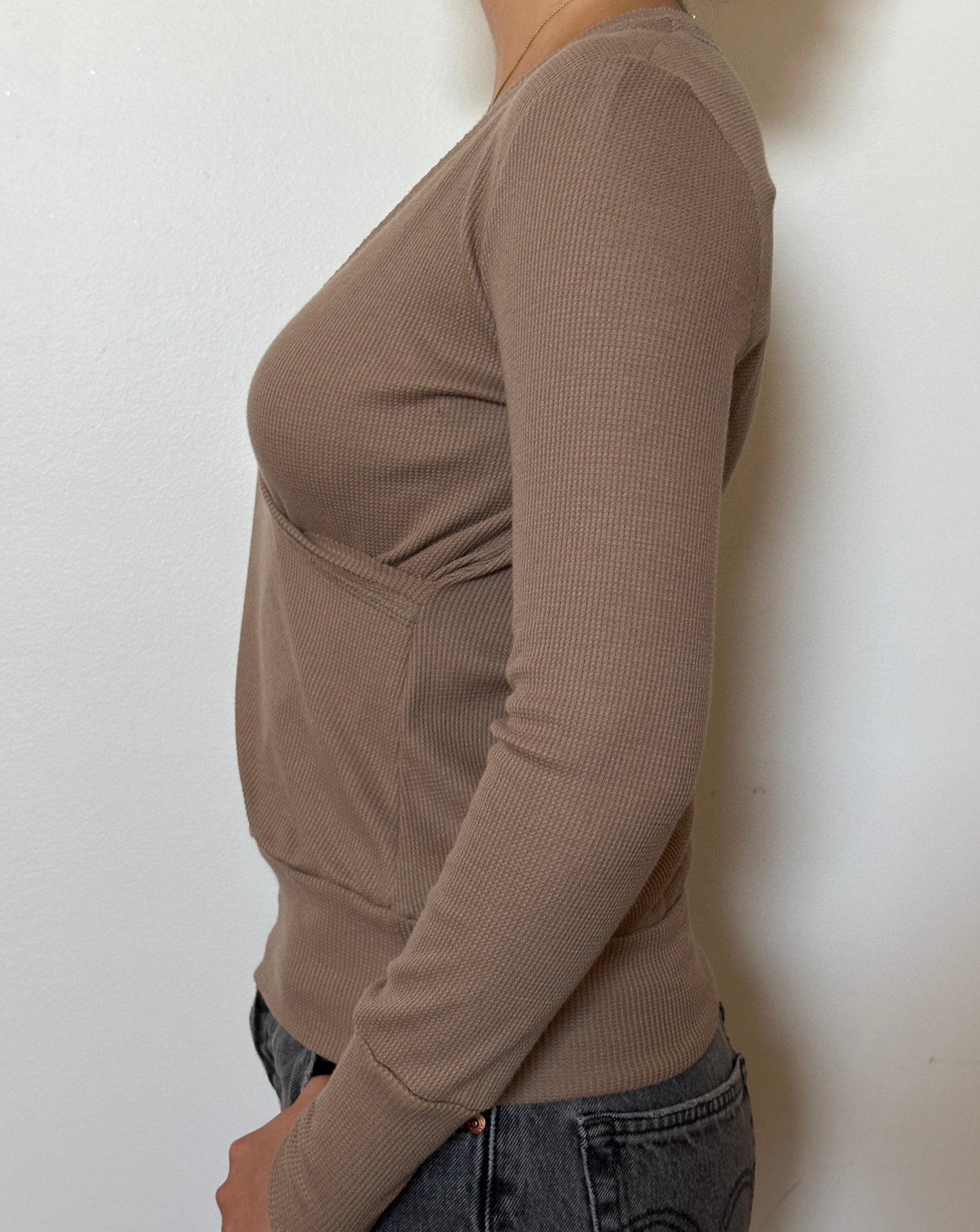 Female model wearing a bark (beige) long sleeve cotton thermal knit wrap top - Pete Collection