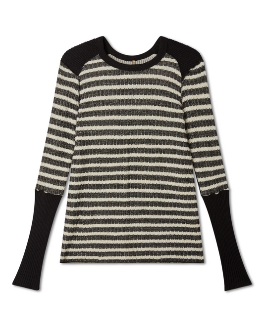 flat lay image of a striped black and white (ivory) raglan long sleeve top with ribbed detailing and sleeves on a white background. - Pete Collection