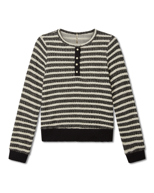 Flat lay image of a striped long-sleeved Henley with black/charcoal and white/cream pattern on a white background