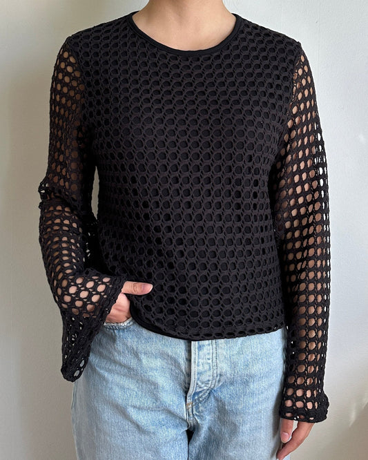 Female model wearing a black crochet bell sleeve long sleeve cotton knit - Pete Collection