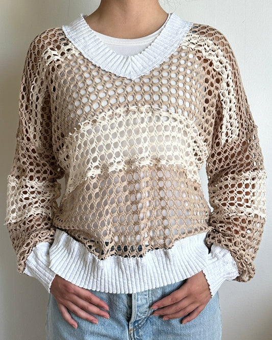 Female model wearing a v neck coconut milk (white) beige, and cream cotton crochet long sleeve top - Pete Collection