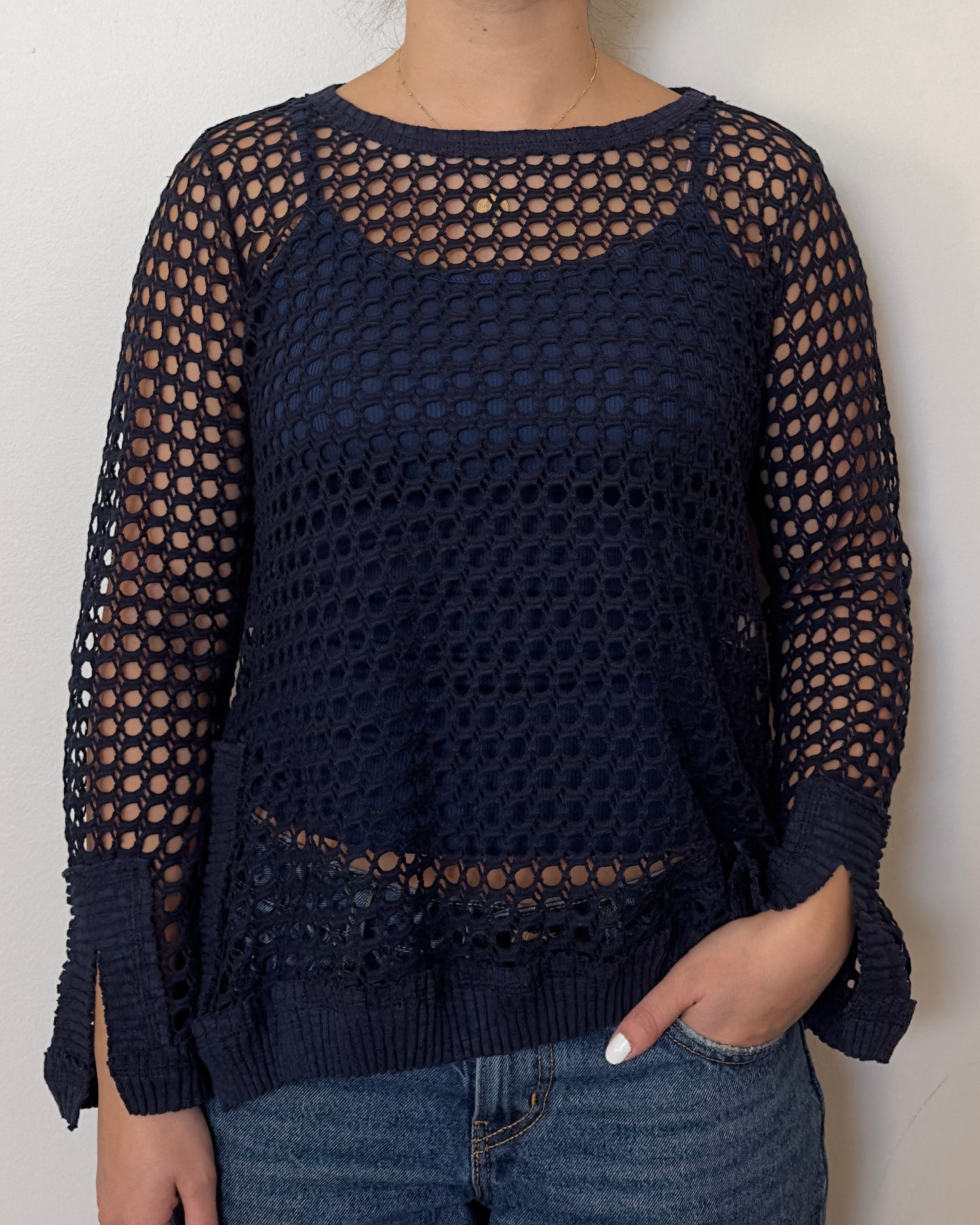 Female model wearing a solid crochet navy long sleeve cotton knit - Pete Collection