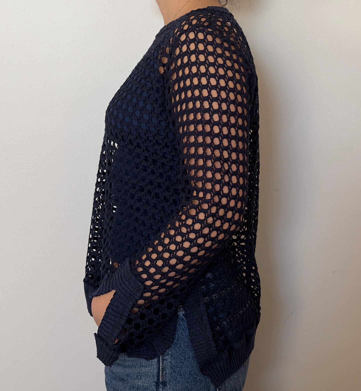 Female model wearing a solid crochet navy long sleeve cotton knit - Pete Collection